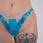 Blue lace lingerie set on a plain background