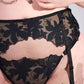black lace garter belt with chains on a white background